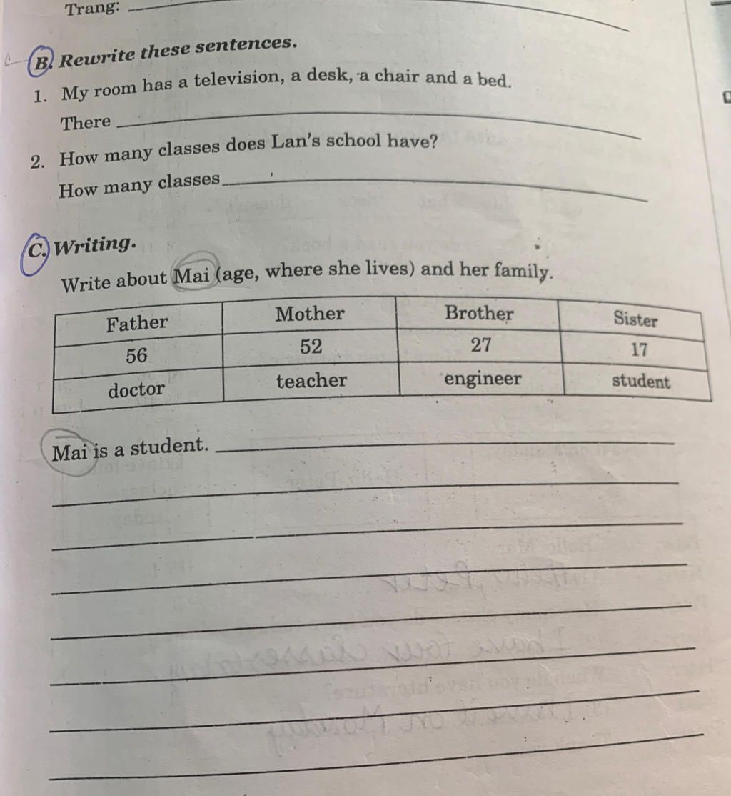 Trang B Rewrite these sentences. 1. My room has a television, a desk, a ...